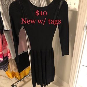 Black Form Fitting Flared Ribbed Long Sleeve Dress